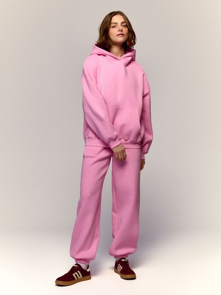 Jasnoróżowe spodnie dresowe jogger