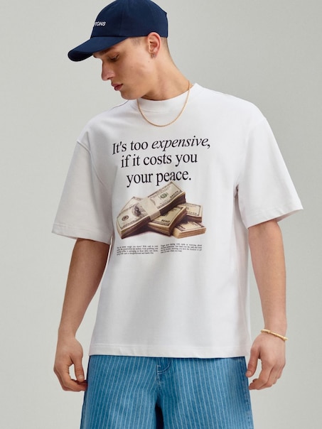 Biała koszulka z nadrukiem It's too expensive if it costs you your peace