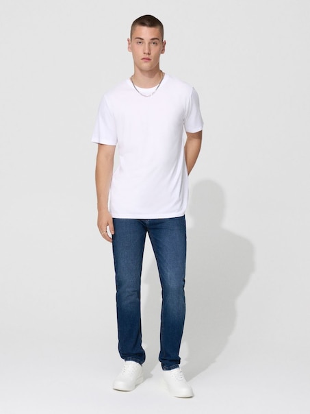 Джинси slim з вареним ефектом