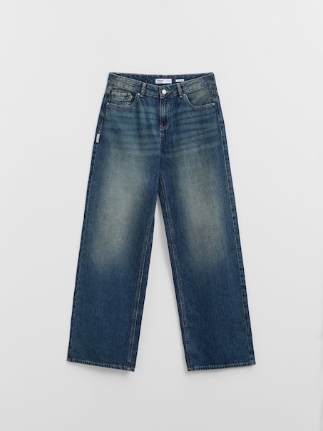 Ciemnoniebieskie jeansy wide leg z niskim stanem