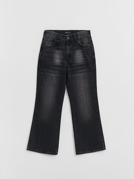 Розкльошені джинси