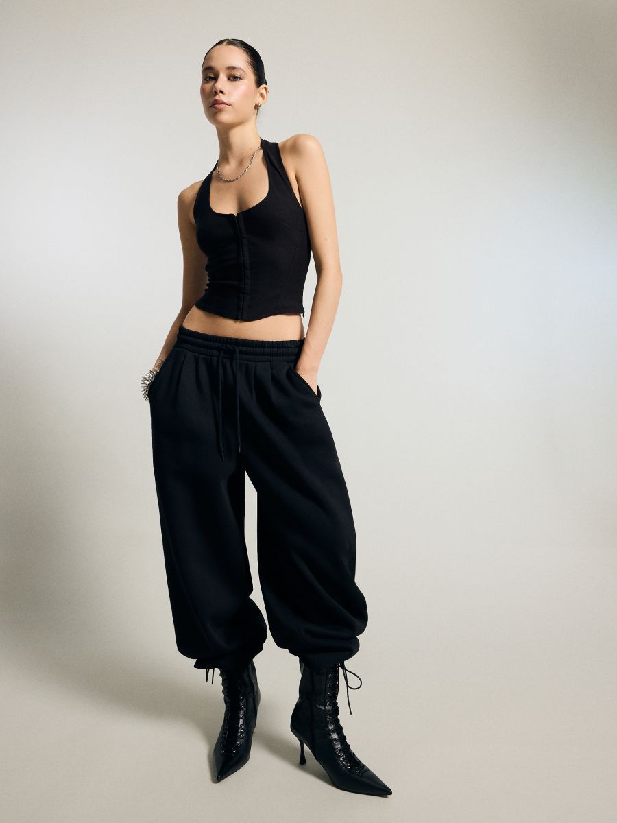 Czarne spodnie dresowe baggy fit basic - czarny - HOUSE