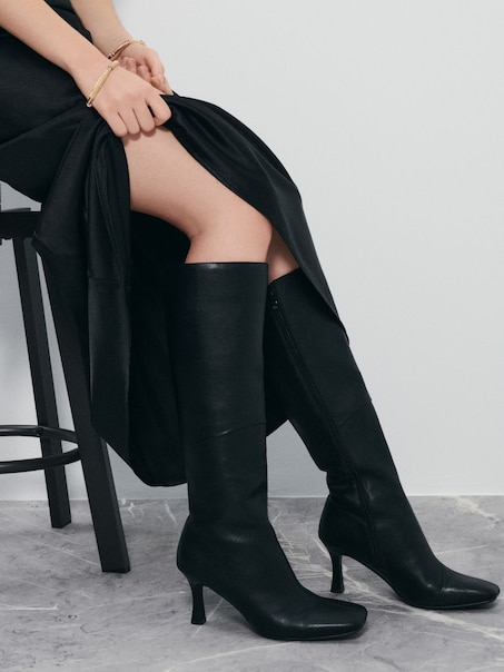 Чоботи на підборах