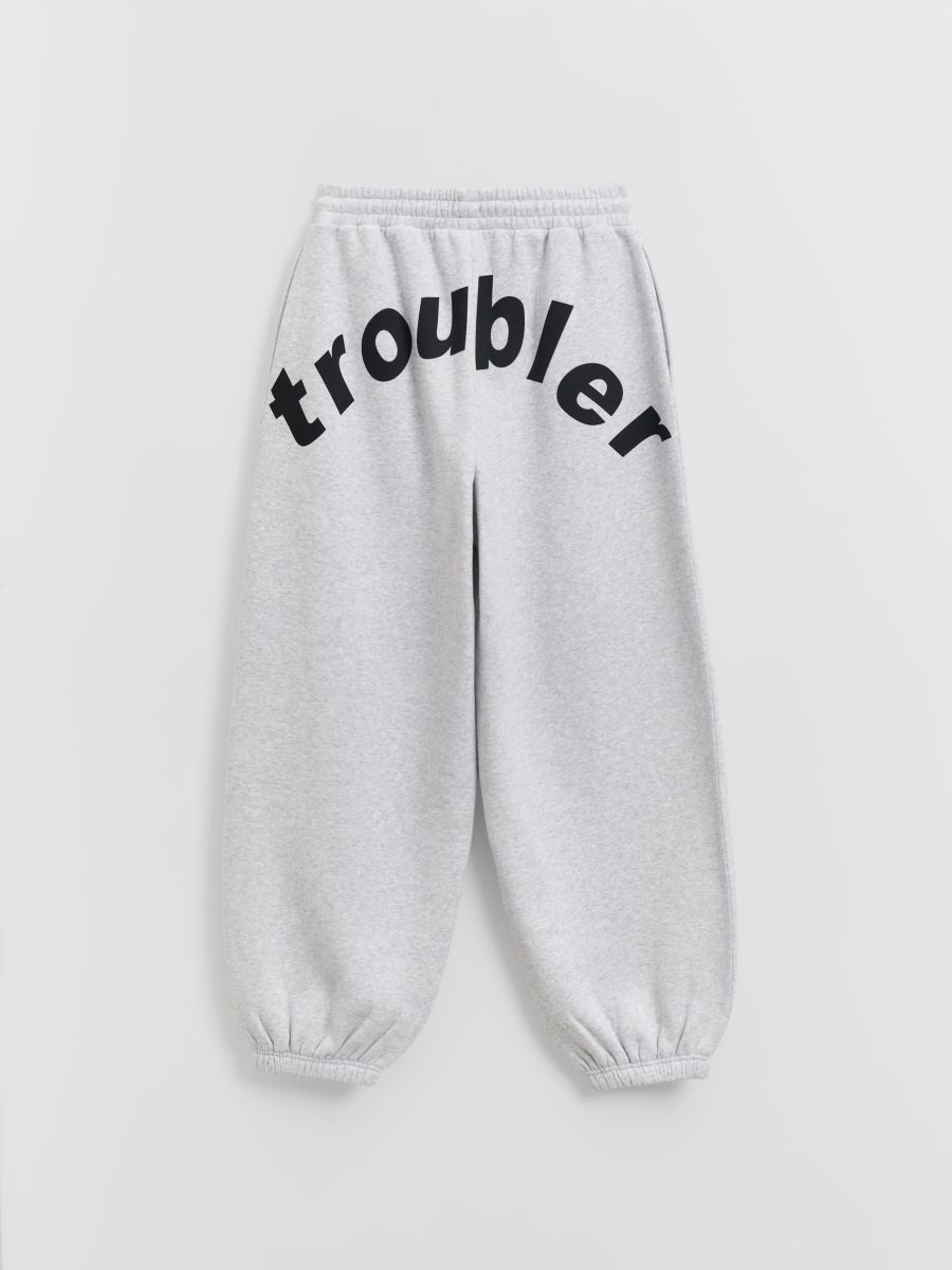 Jasnoszare spodnie dresowe z nadrukiem troubler na tyle - jasnoszary - HOUSE