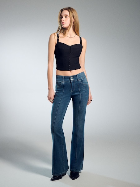 Джинси кльош із заниженою талією