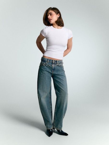 Niebieskie jeansy bootcut baggy fit z ozdobami na tylnych kieszeniach