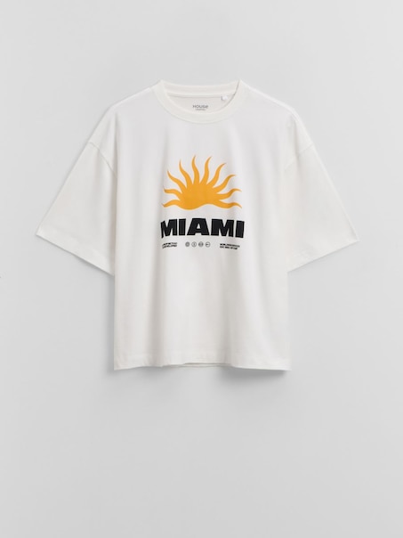 Kremowa koszulka z nadrukiem Miami