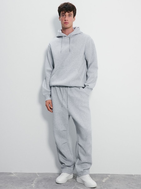 Szare spodnie dresowe baggy z regulacją na dole