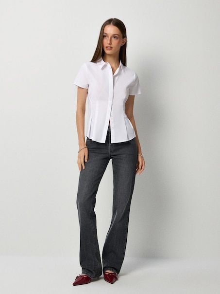 Джинси кльош із заниженою талією