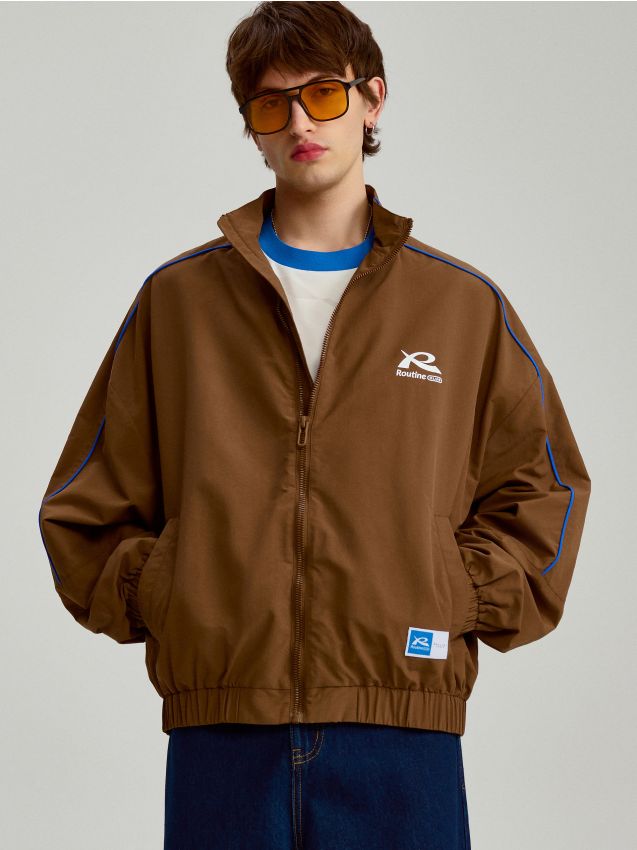 Brązowa sportowa kurtka przejściowa w stylu retro