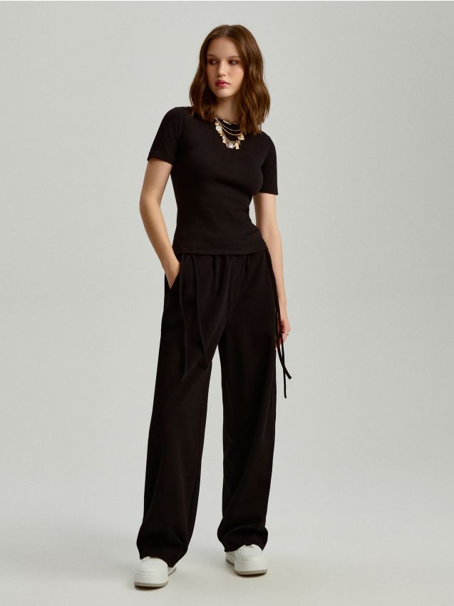 koko Czarne spodnie dresowe z kokardkami - HOUSE - 377CK-99X