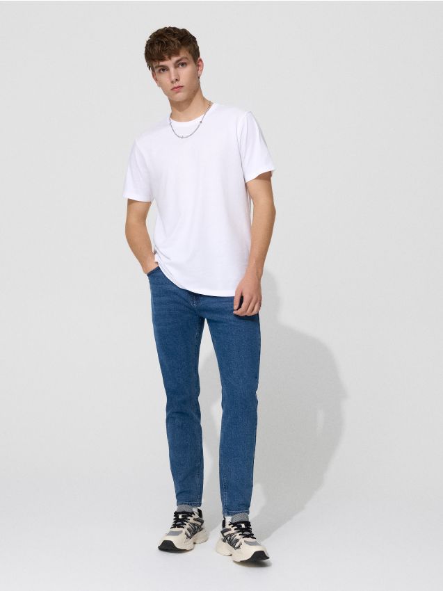 Granatowe jeansy carrot fit