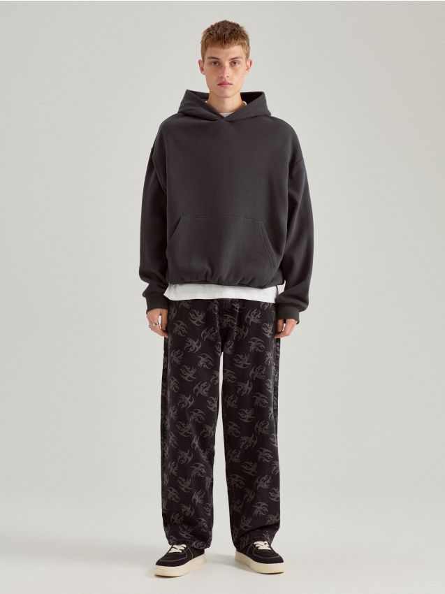 Jeansy baggy fit typu skater w print all over - HOUSE